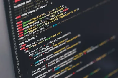 Next.js logo with code snippets for an article by Atlanta based Software Engineer, Namir Ahmed.